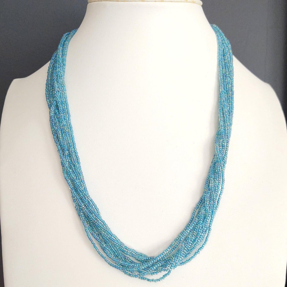 Vintage multi strand iridescent light blue seed bead necklace